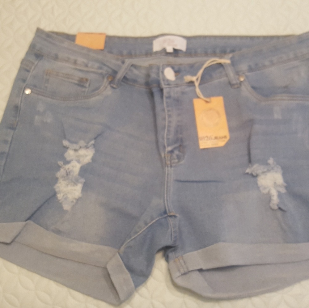 Cuffed distressed denim shorts